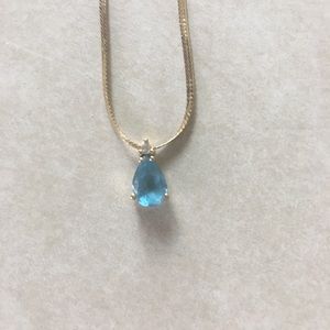 14k gold chain with blue topaz pendant